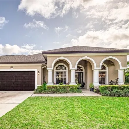 Buy this 4 bed house on 5452 Pebble Beach Drive in Polk County, FL 33812