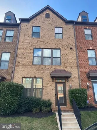 Rent this 3 bed townhouse on 9338 Sweet Bay Magnolia Court in Merrifield, VA 22031