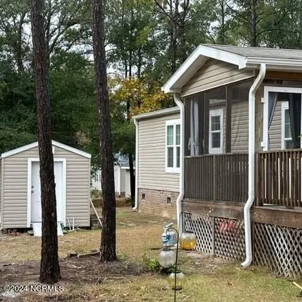 Buy this studio apartment on 3423 Marlin Drive in Brunswick County, NC 28422
