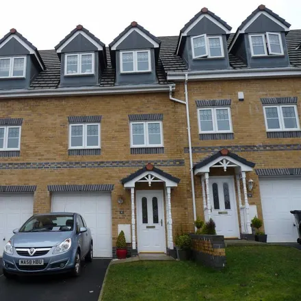 Rent this 4 bed townhouse on Engel Close in Holcombe, BL0 9XU