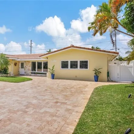Buy this 4 bed house on 5255 Northeast 18th Terrace in Coral Hills, Fort Lauderdale