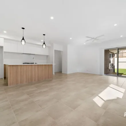 Rent this 4 bed apartment on Collingwood Drive in Collingwood Park QLD 4301, Australia