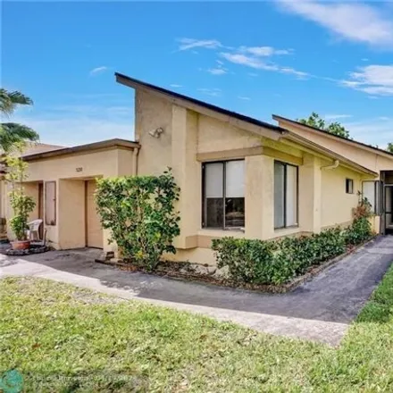 Rent this 3 bed house on 5201 Gate Lake Road in Tamarac, FL 33319