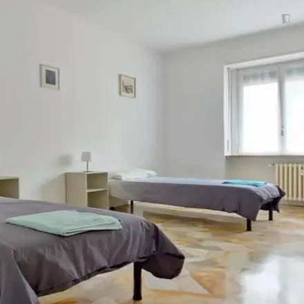 Rent this 4 bed room on Piazza Bolivar in Via Lorenteggio, 20146 Milan MI