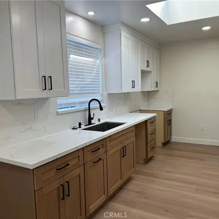 Rent this 4 bed apartment on 7313 Darby Place in Los Angeles, CA 91335