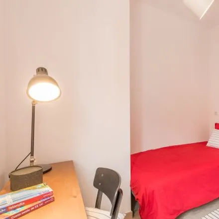 Rent this 4 bed room on Calle Margaritas in 31, 28039 Madrid