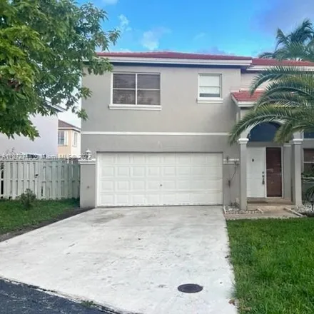 Rent this 4 bed house on 9900 Southwest 3rd Street in Pembroke Pines, FL 33025