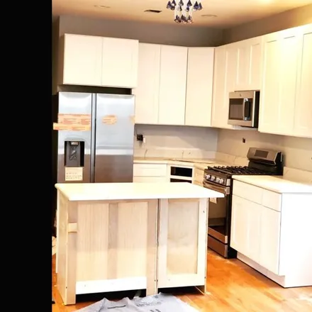 Rent this 3 bed house on 859 North Richmond Street in Chicago, IL 60622