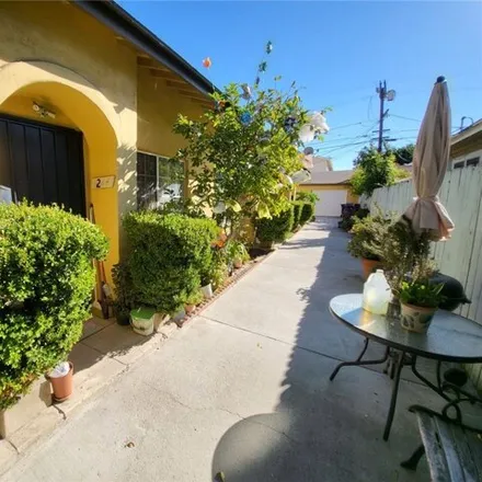 Image 2 - 1240 South Muirfield Road, Los Angeles, CA 90019, USA - House for sale