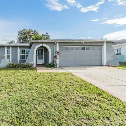Buy this 3 bed house on 6900 Pin Cherry Lane in Jasmine Estates, FL 34668