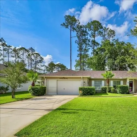 Buy this 3 bed house on 51 Esperanto Drive in Palm Coast, FL 32164