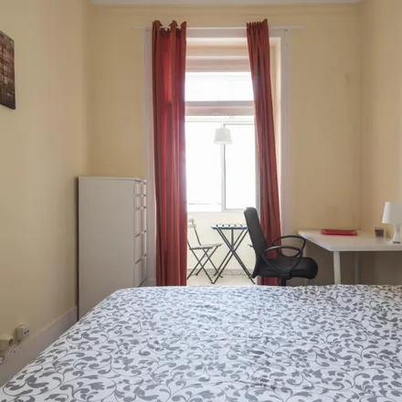 Rent this 5 bed room on Rua António Pereira Carrilho 34 in 1000-047 Lisbon, Portugal