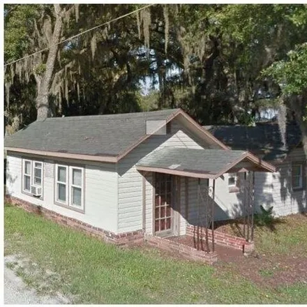 Rent this 3 bed house on 179 West Palmetto Lane in Polk City, Polk County