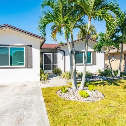 Buy this 3 bed house on 653 106th Avenue North in Collier County, FL 34108