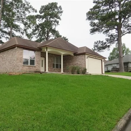Rent this 3 bed house on 7011 Shady Knoll Lane in Montgomery County, TX 77318