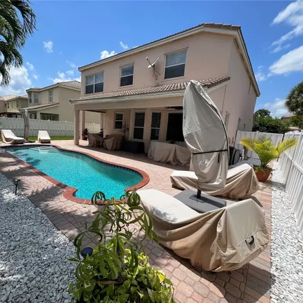 Rent this 5 bed house on Southwest 53rd Court in Miramar, FL 33027