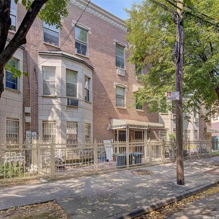 Buy this 6 bed townhouse on 1145 Commonwealth Avenue in New York, NY 10472