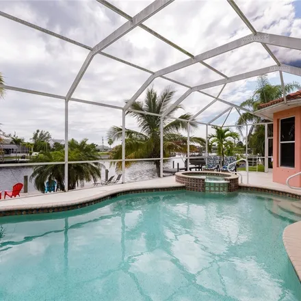 Rent this 4 bed house on 3806 Southwest 2nd Street in Cape Coral, FL 33991