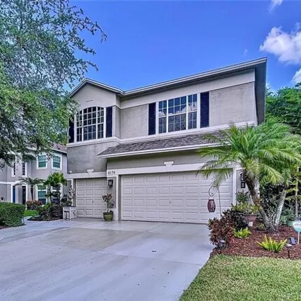 Buy this 5 bed house on 4188 Grandchamp Circle in East Lake, FL 34685