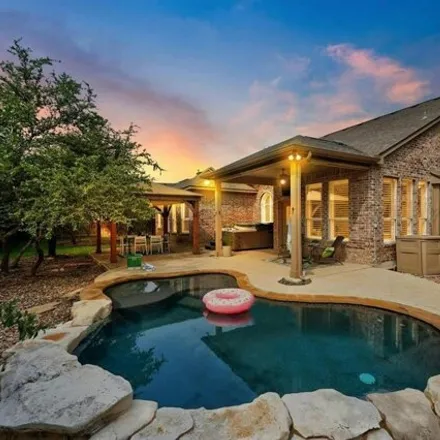Buy this 4 bed house on 1233 Quiet Creek Drive in Cedar Park, TX 78613
