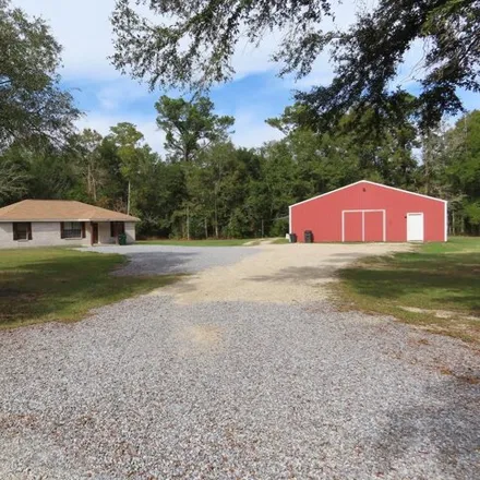 Buy this 5 bed house on 5361 Old Gainsville Road in Bay Saint Louis, MS 39520