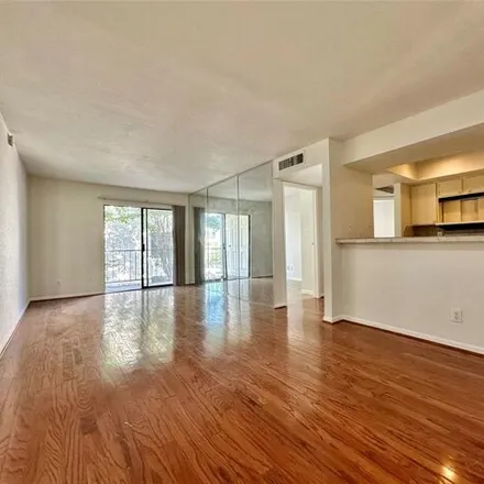 Rent this 2 bed condo on 8410 West Bartell Drive in Houston, TX 77054