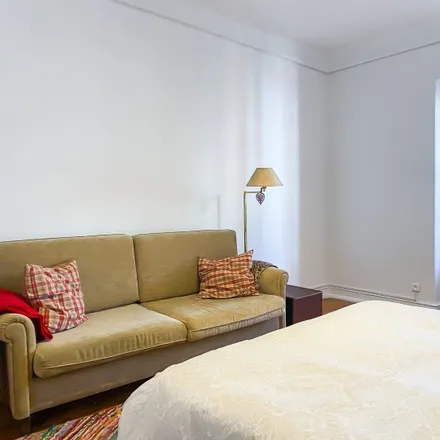 Rent this 4 bed room on Avenida Mouzinho de Albuquerque in 1170-284 Lisbon, Portugal