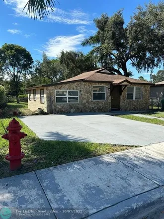 Buy this 3 bed house on Von D Mizell Branch Library in Northwest 6th Court, Fort Lauderdale