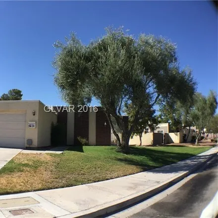 Rent this 3 bed townhouse on 5221 Lakewood Court North in Paradise, NV 89120