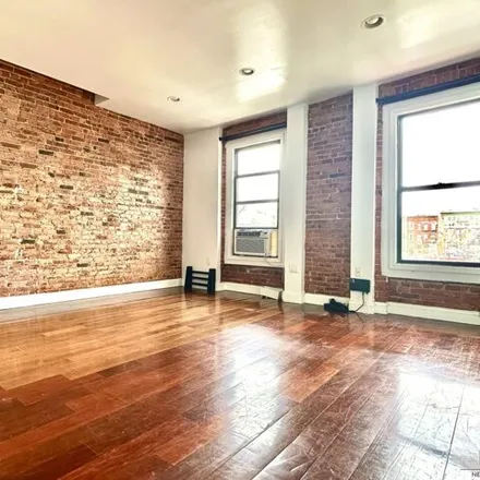 Rent this 2 bed townhouse on 428 East 134th Street in New York, NY 10454
