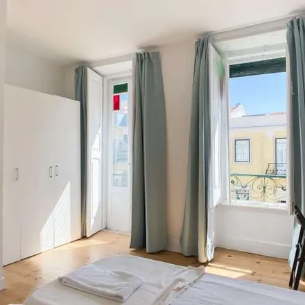 Rent this 5 bed apartment on Kely Barbosa in Rua António Pedro 68-C, 1000-040 Lisbon