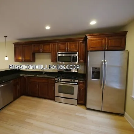 Rent this 4 bed townhouse on 177 Saint James Place in Boston, MA 02119