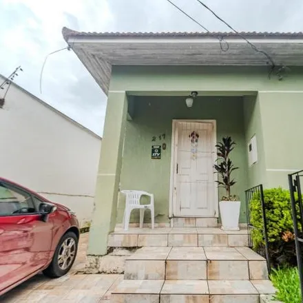 Buy this 3 bed house on Rua Roque Gonzalez in Jardim Botânico, Porto Alegre - RS