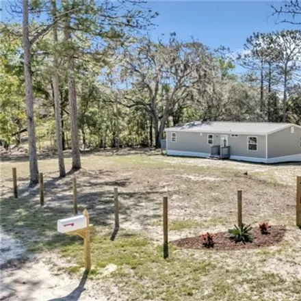 Buy this studio apartment on Northeast 92nd Place in Levy County, FL 32621