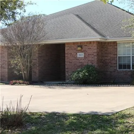 Rent this 3 bed house on 987 Willow Pond Street in College Station, TX 77845