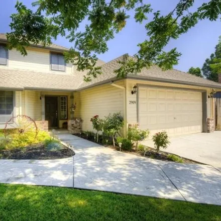 Buy this 4 bed house on 2993 Blossomwood Court in Modesto, CA 95355