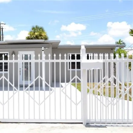 Buy this 4 bed house on 810 East 9th Place in Sun-Tan Village, Hialeah