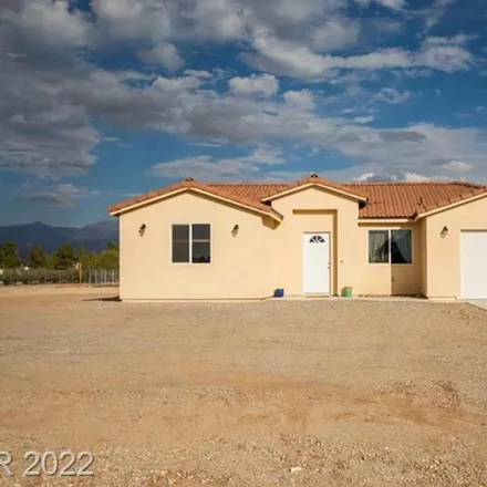Rent this 3 bed house on 2839 Yucca Terrace Avenue in Pahrump, NV 89048