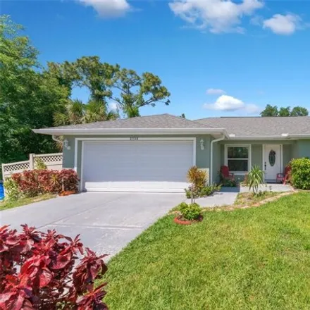 Buy this 3 bed house on 2744 Orchard Circle in North Port, FL 34288