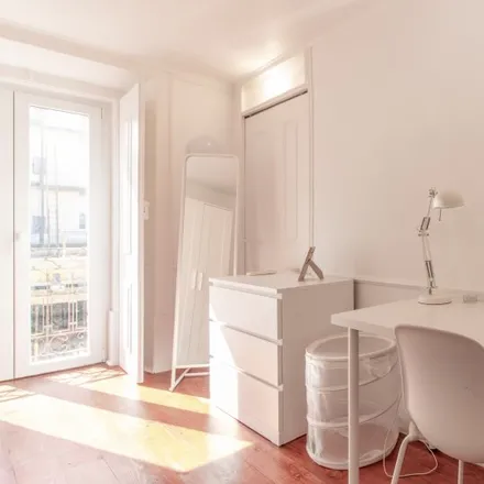Rent this 4 bed room on Rua Filipe Folque 5 in 1050-016 Lisbon, Portugal