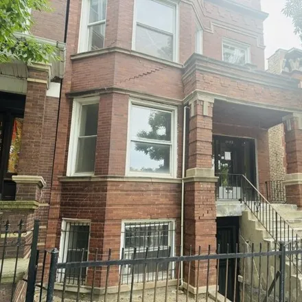 Buy this 8 bed house on 1442 North Kedzie Avenue in Chicago, IL 60647