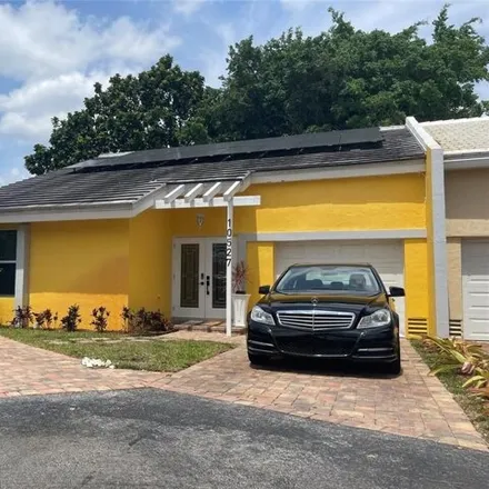 Rent this 2 bed house on La Placida Drive in Coral Springs, FL 33065