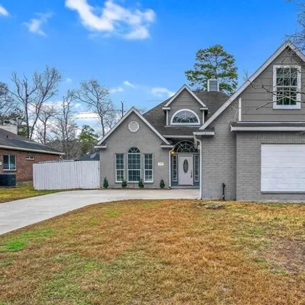 Buy this 3 bed house on 3240 Shadowcrest Lane in Montgomery County, TX 77380