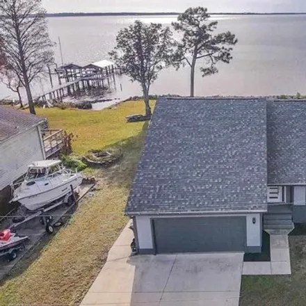 Buy this 4 bed house on 3557 Maikai Drive in Ramsey Beach, Escambia County