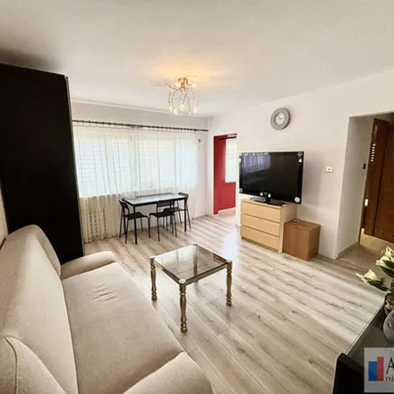 Rent this 3 bed apartment on Poranek 15a in 60-338 Poznan, Poland