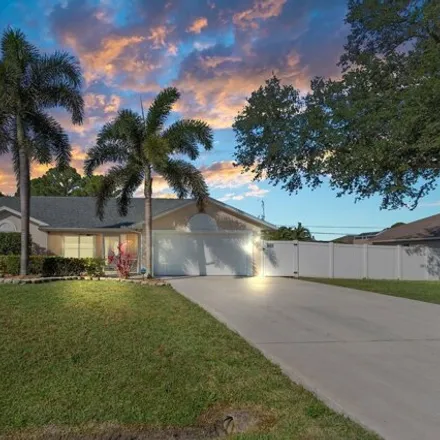 Buy this 3 bed house on 1708 Southwest Cecelia Lane in Port Saint Lucie, FL 34953