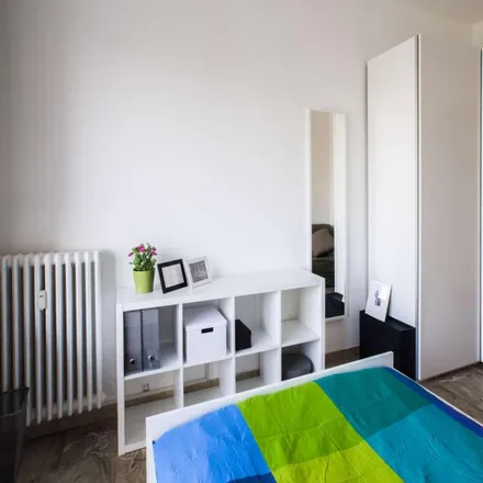Rent this 3 bed room on Stuparich - Albani in Piazza Carlo Stuparich, 20148 Milan MI