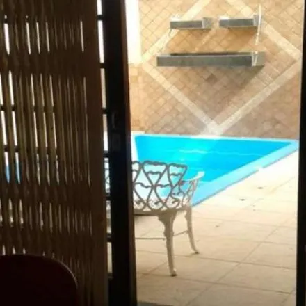 Rent this 6 bed house on Rua 2438 in Centro, Balneário Camboriú - SC