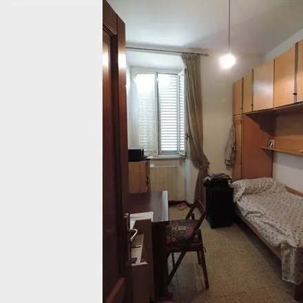 Rent this 2 bed room on Via Ferruccio in 10, 00185 Rome RM