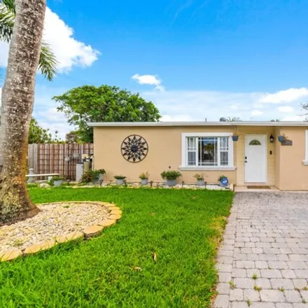 Buy this 3 bed house on 200 Northeast 61st Street in Broward County, FL 33334